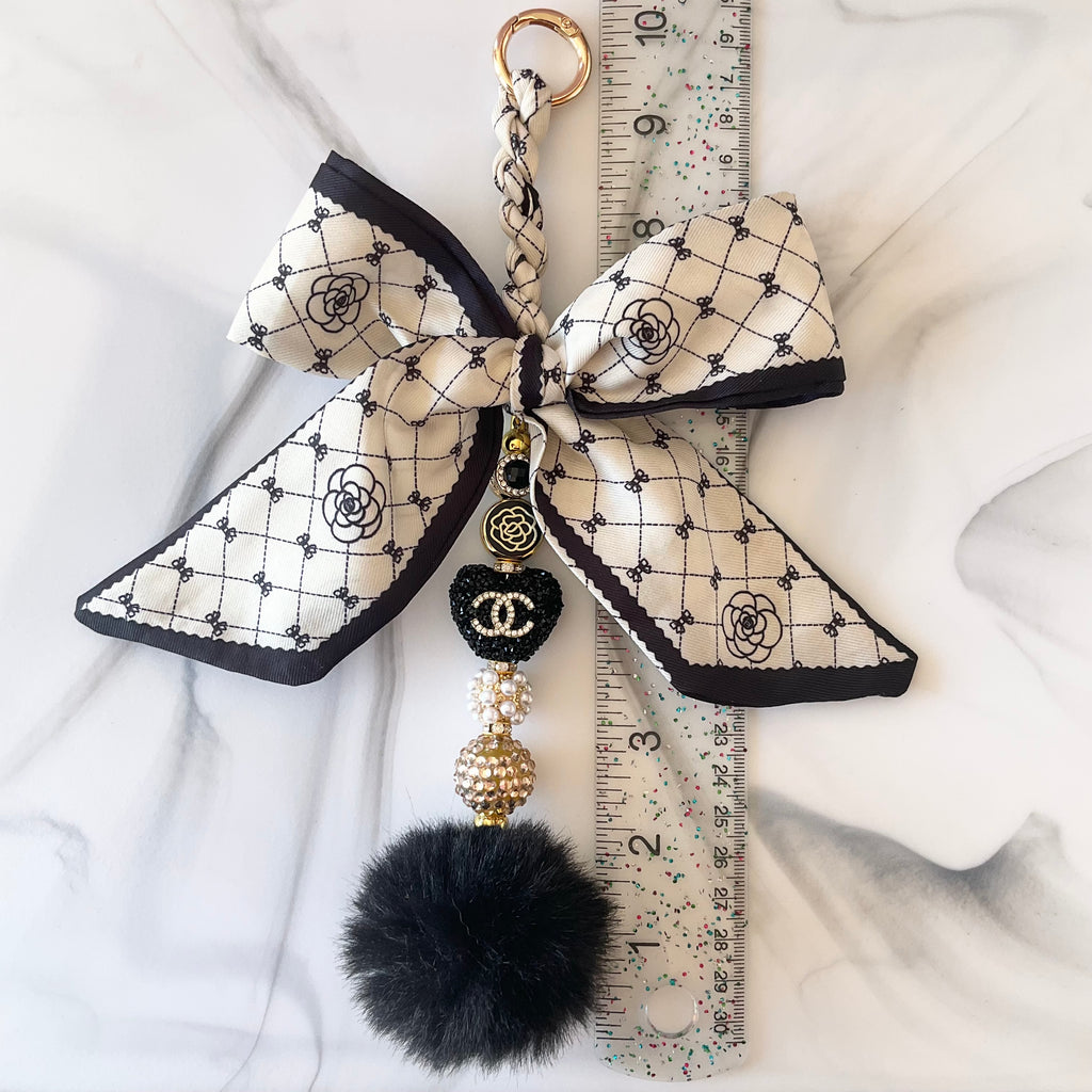 Cici Gold and Black Bow Bag Charm