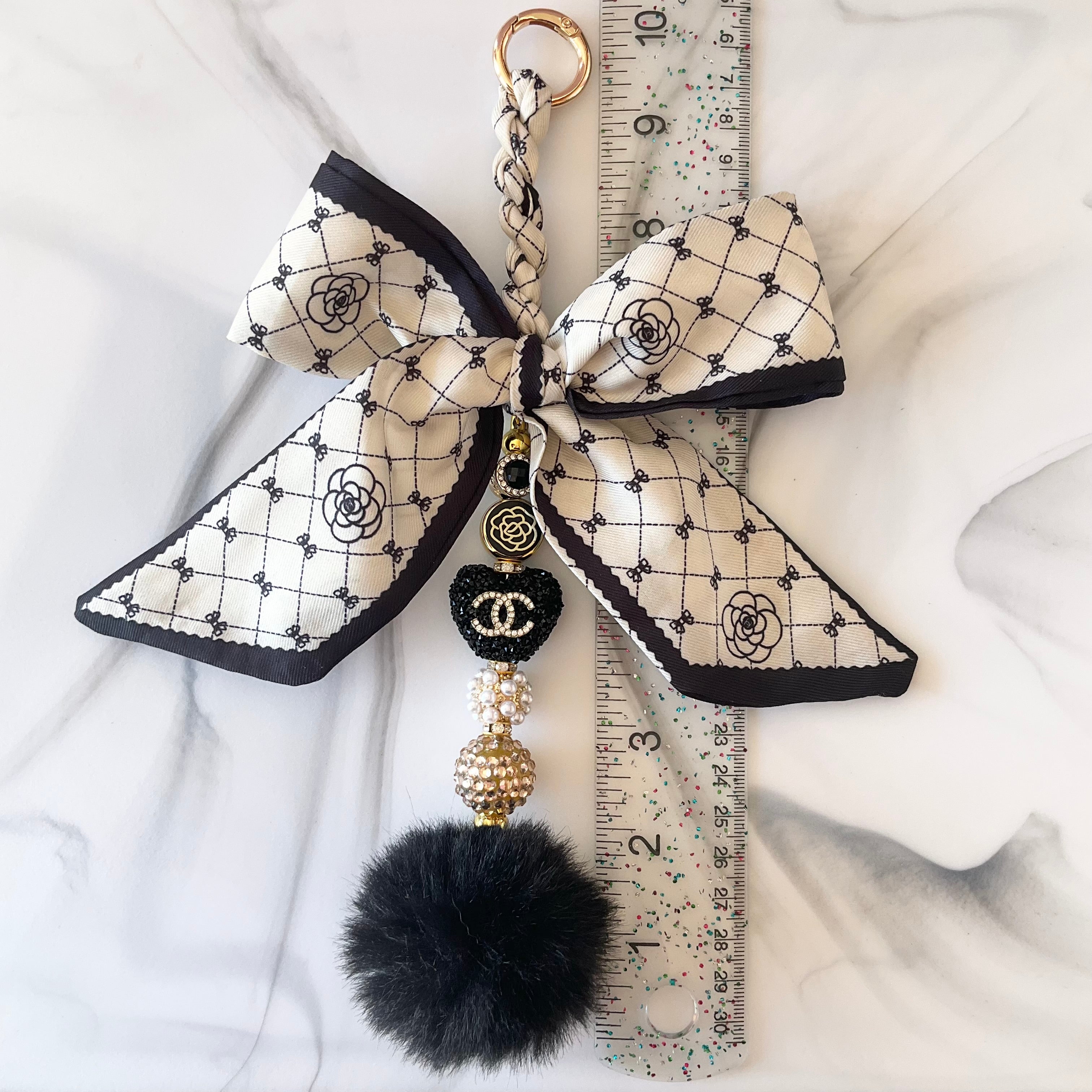 Cici Gold and Black Bow Bag Charm