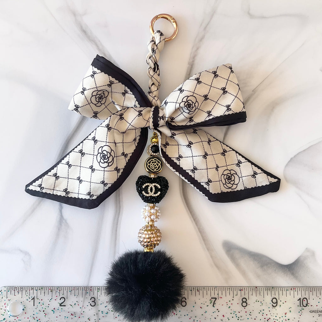 Cici Gold and Black Bow Bag Charm